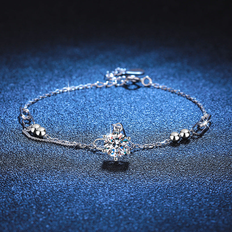 Solitaire moissanite bracelet on blue velvet