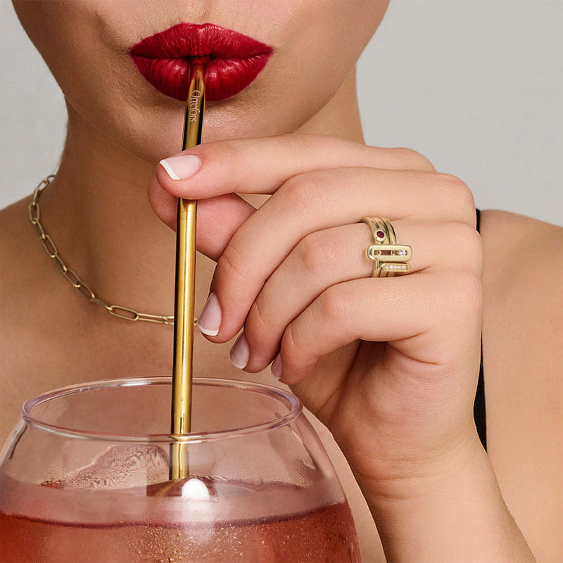 Model with gold ring and red lips